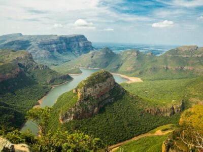 landscape photography of mountains under blue sky