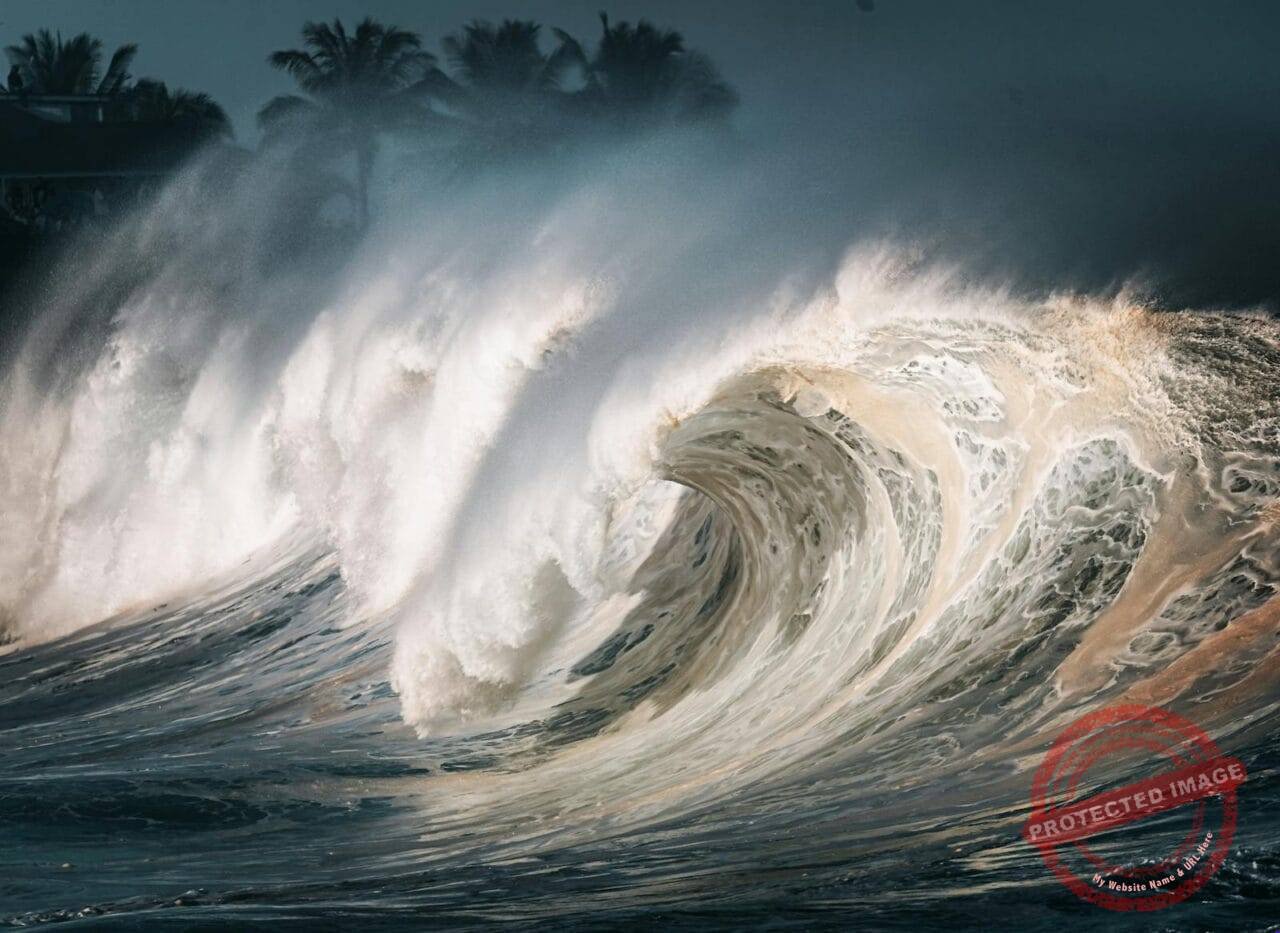 Captivating image of massive ocean waves breaking on the shore, creating a dramatic scene.