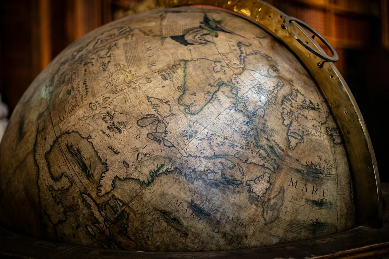 An old globe with maps
