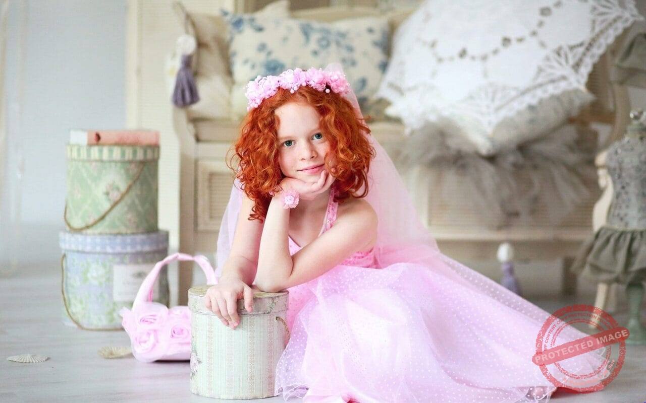 Cute princess in pink dress little girl