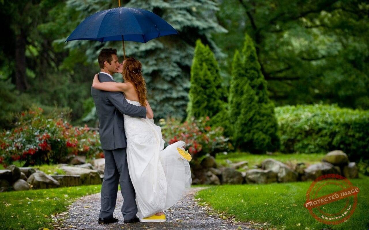 Kissing couple under umbrella photography