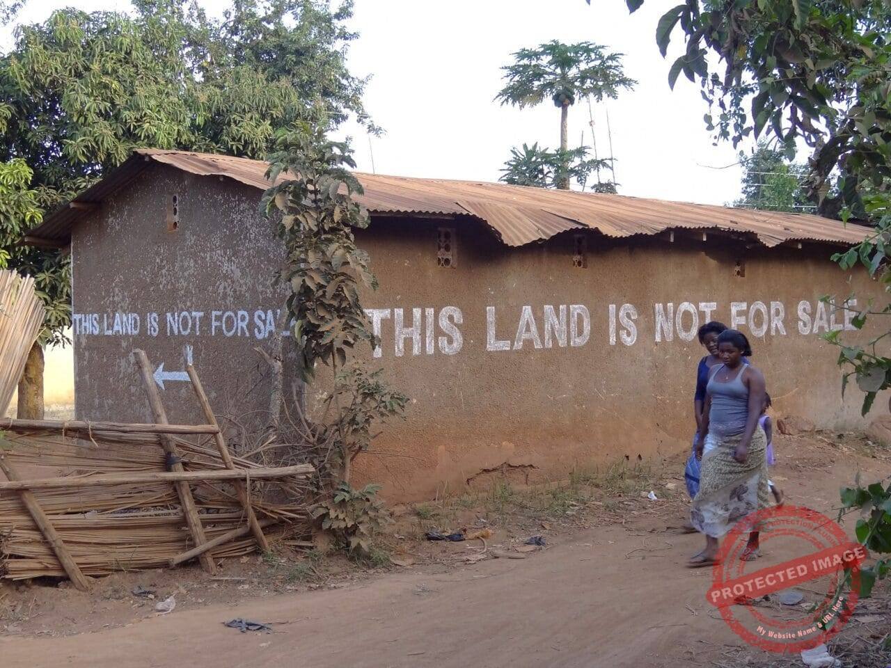 This Land Is Not For Sale Sign Outside Entebbe Uganda