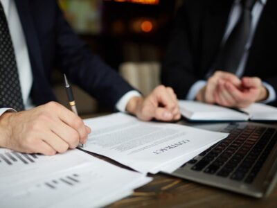 businessman-reading-contract-closeup_1098-14742