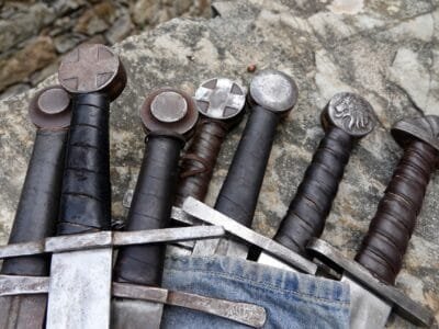 a bunch of different types of tools on a rock