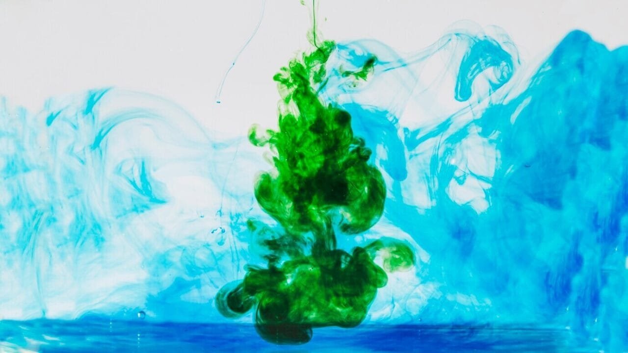 Green Dye Spilling Into Blue 23