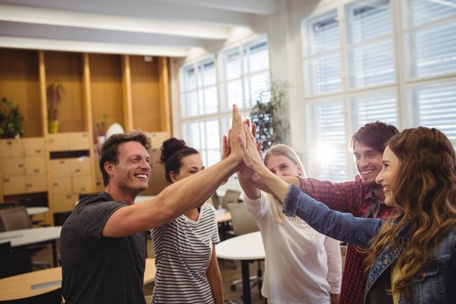 group-business-executives-giving-high-five-2