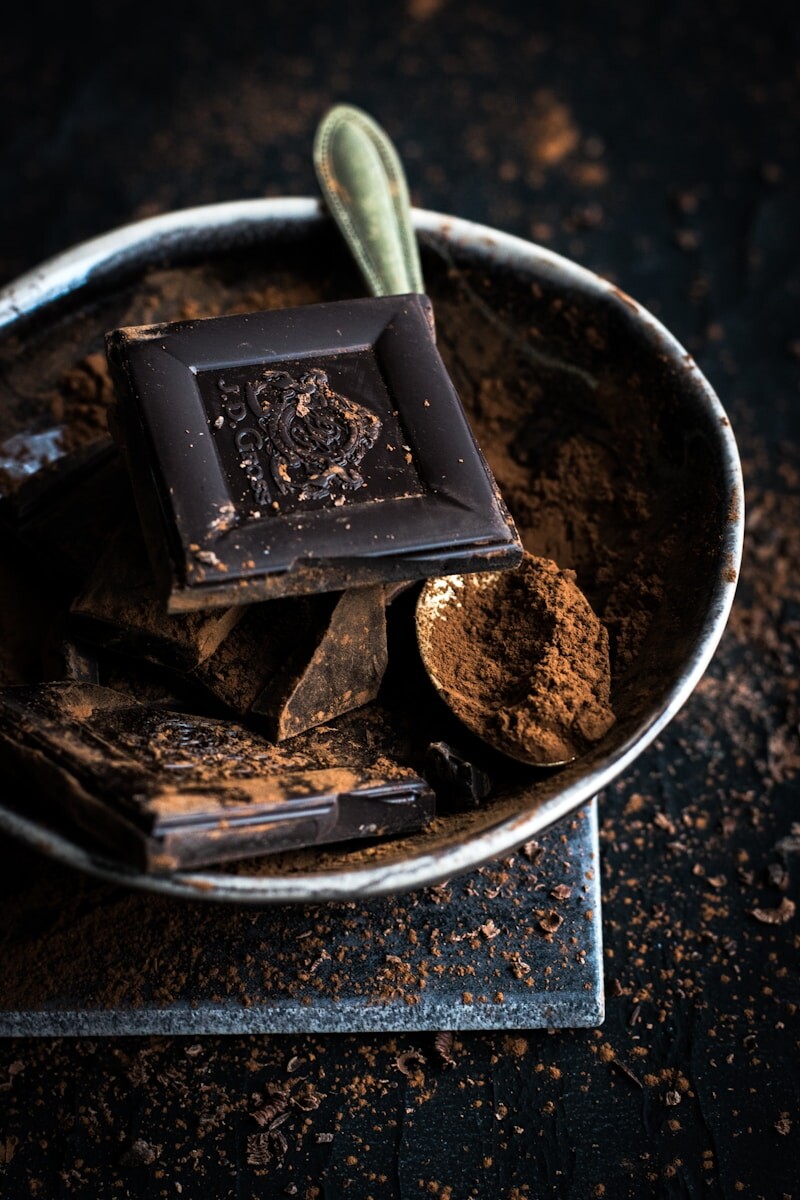 chocolate bar and powder in bowl