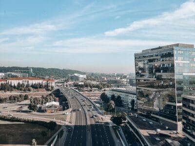 a city street with cars and buildings