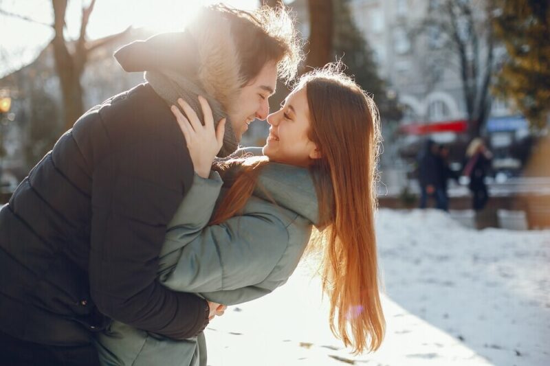 loving-couple-walking-winter-park_1157-19413