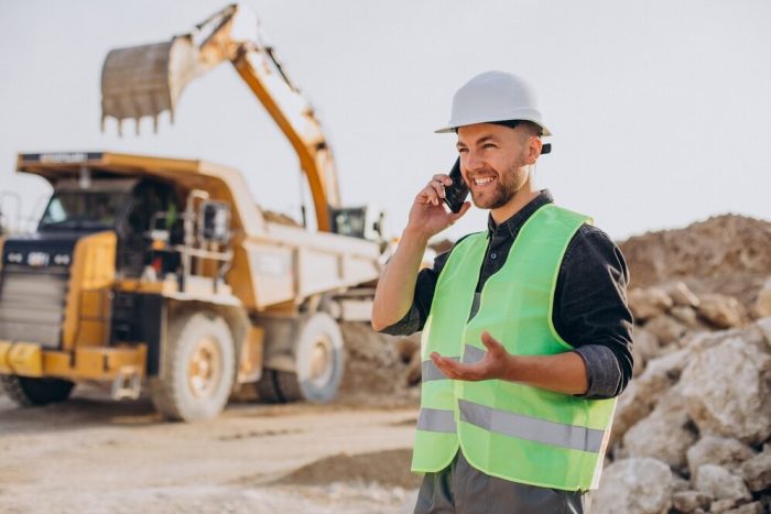 male-worker-with-bulldozer-sand-quarry_1303-28102