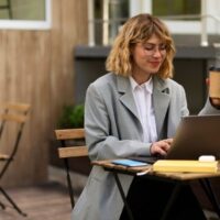 medium-shot-woman-working-laptop