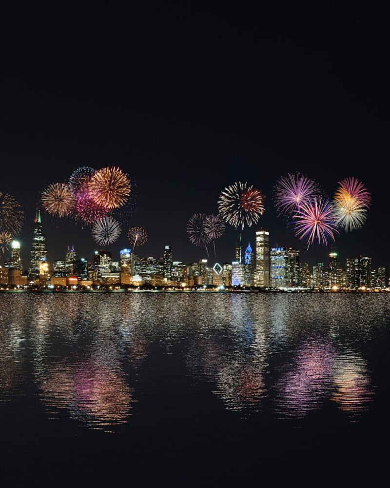 skyline buildings under fireworks display