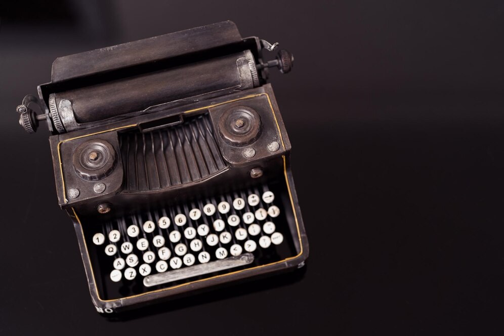old-typewriter-black-glass-background-mock-up-ready-design_158595-7980