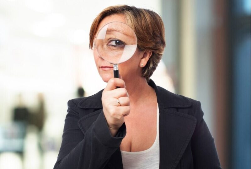 old-woman-with-magnifier_1149-1126