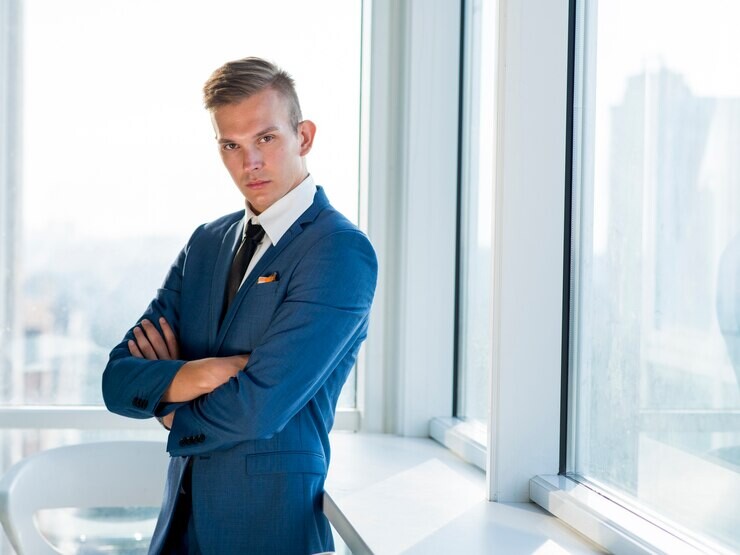 portrait-young-businessman-with-folded-arms