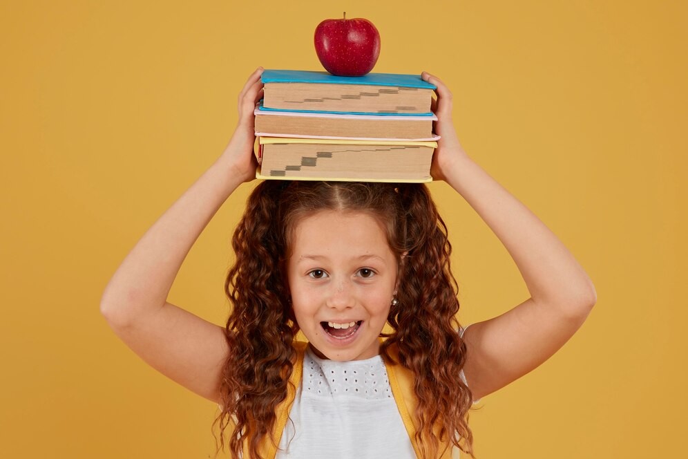 school-girl-holding-books-apple-her-head_23-2148764027