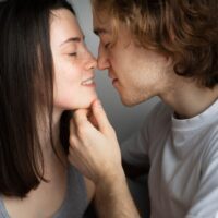 side-view-couple-almost-kissing_23-2148429153
