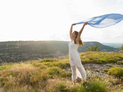 side-view-woman-nature-with-scarf-wind_23-2148614761