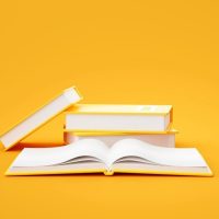 stack-books-yellow-background-education-concept-3d-rendering_56104-1337