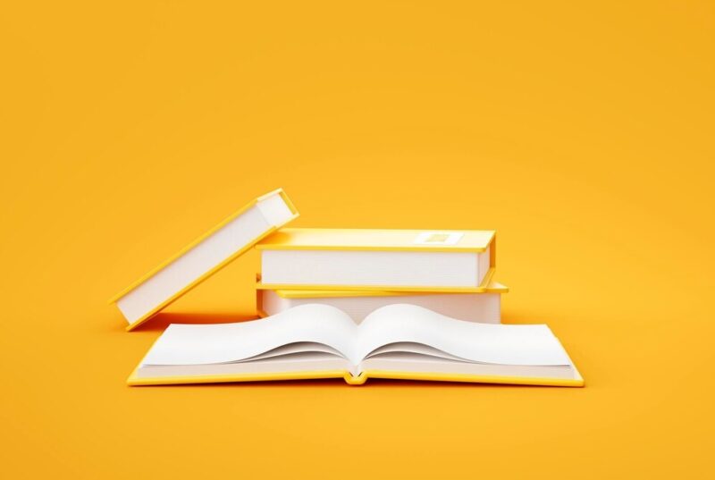 stack-books-yellow-background-education-concept-3d-rendering_56104-1337