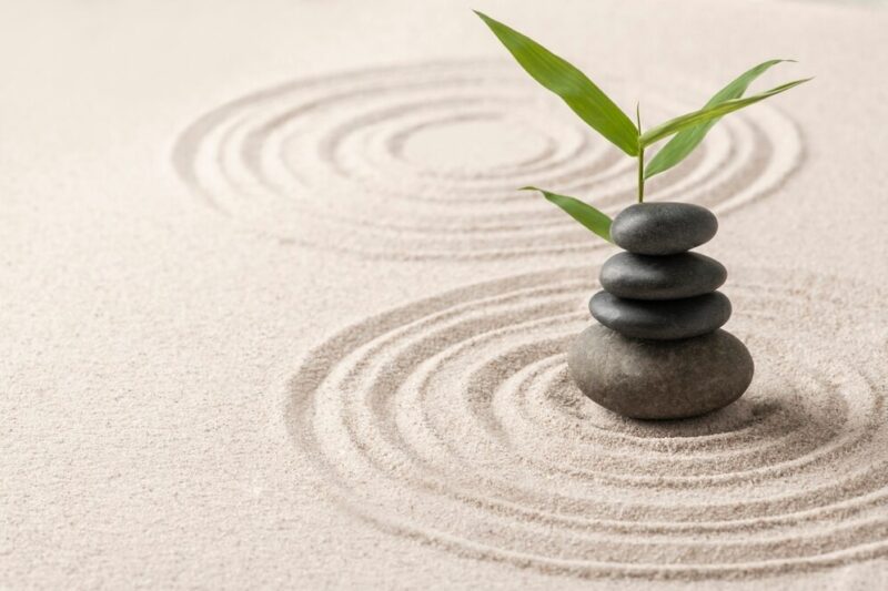 stacked-zen-stones-sand-background-art-balance-concept_53876-110628