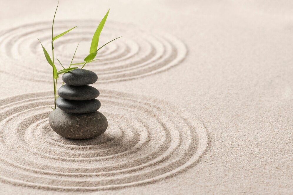 stacked-zen-stones-sand-background-art-balance-concept_53876-110629