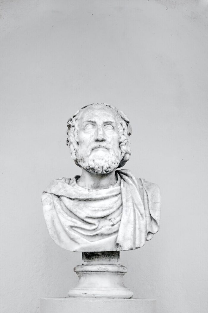 vertical-shot-bust-philosopher-isolated_181624-23590