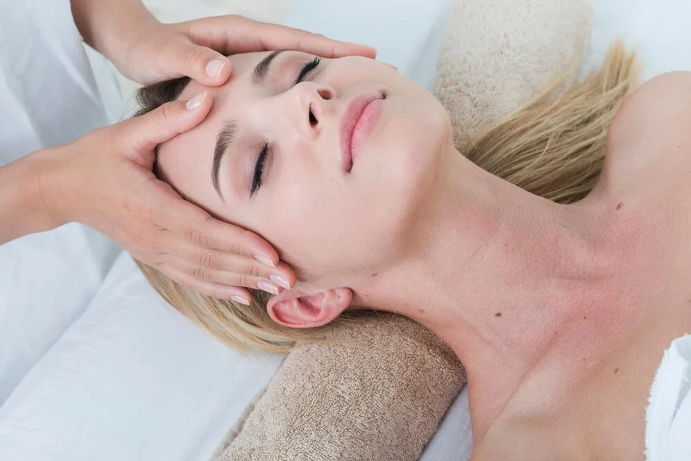 Woman receiving facial massage spa 23 2148206193.jpg
