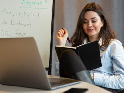 woman-with-notepad-pen-her-hands_140725-7622