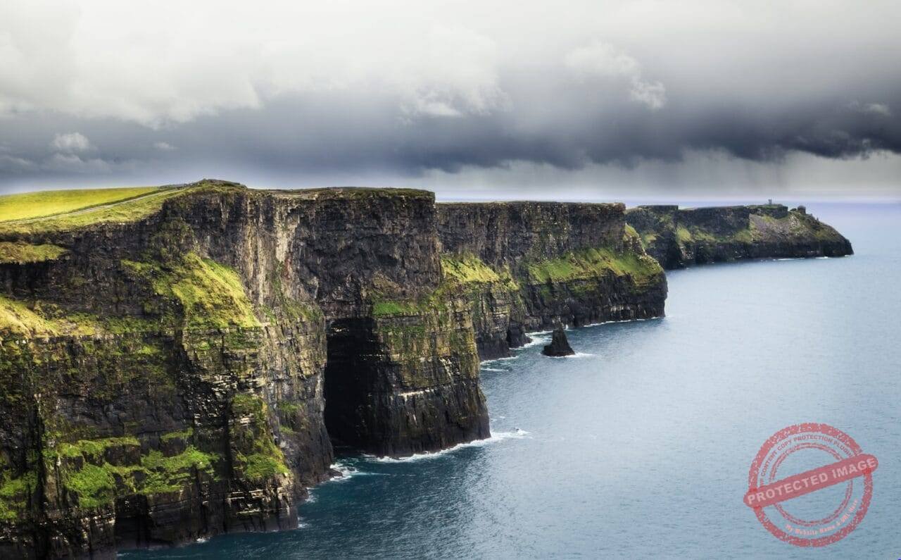 sea and cliff during daytime