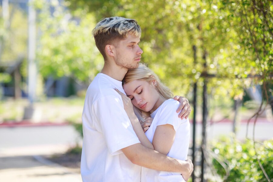 young couple each other s woman put her head man s chest high quality photo Straipsniai.lt