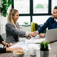 young-happy-couple-meeting-with-financial-advisor-office-woman-is-handshaking-with-agent_637285-3904