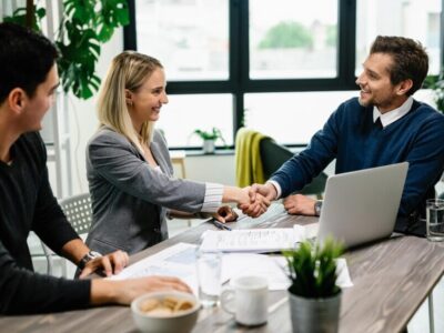 young-happy-couple-meeting-with-financial-advisor-office-woman-is-handshaking-with-agent_637285-3904