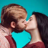 young-man-woman-kissing_155003-8368