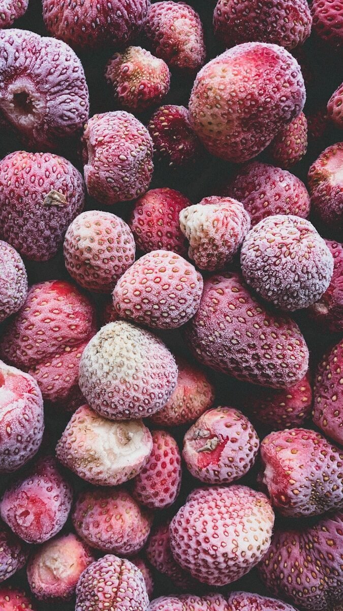 red and white round fruits